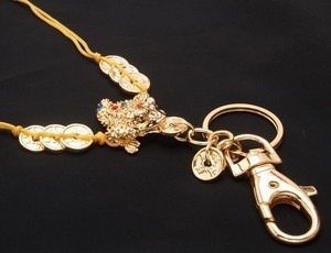 The Golden 3 Legged Toad with 8 coins keychain