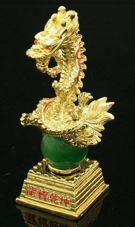 Golden Victory Dragon Sitting on a Green Pearl